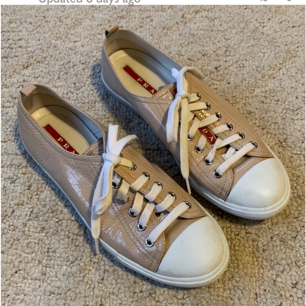 Prada tennis shoes size 38. Used but worn twice. Excellent! Super chic!!
